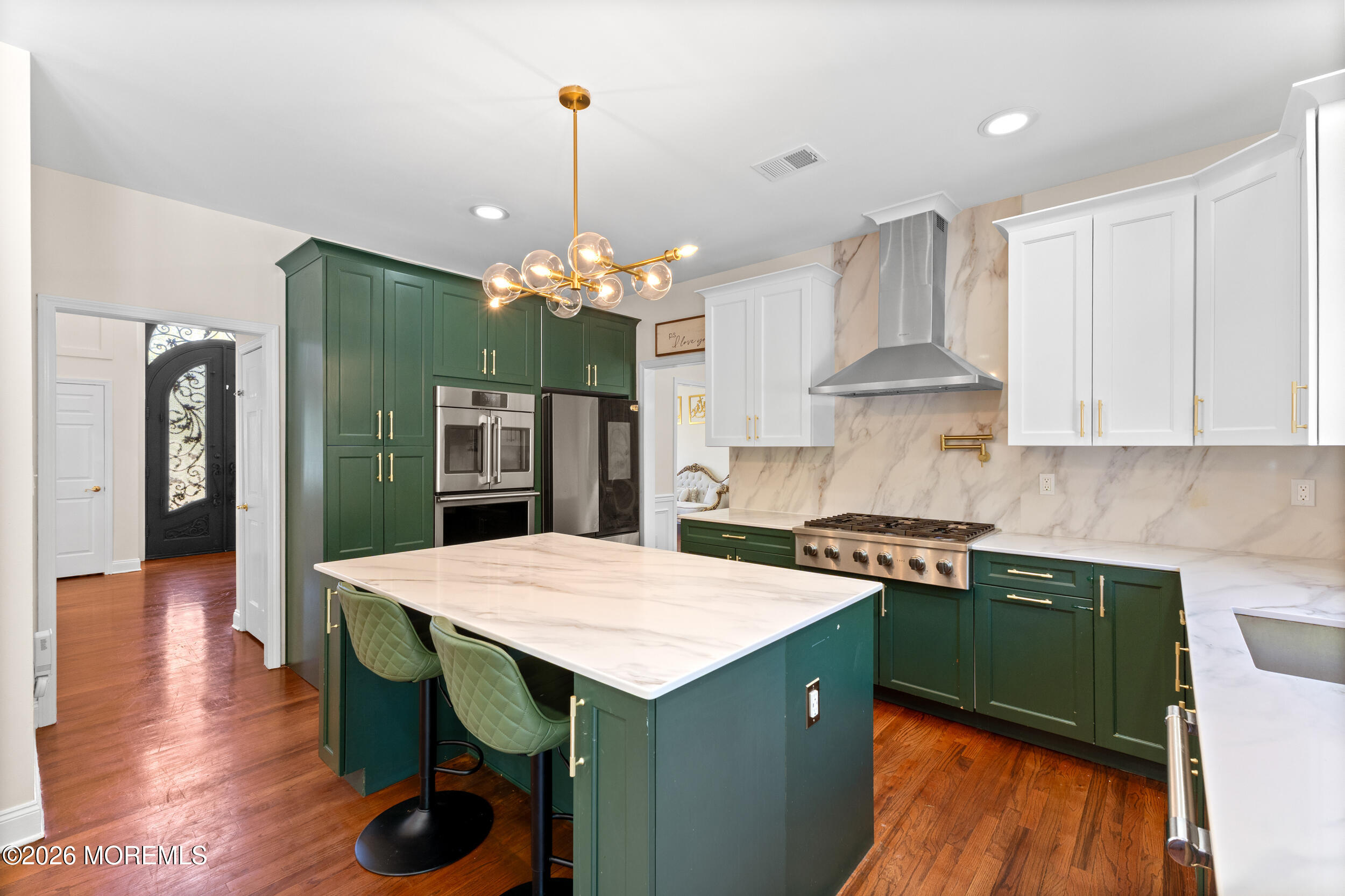 104 Autumn Road Matawan, NJ 07747 - Photo 11 of 64 a kitchen that has a table and chairs in it