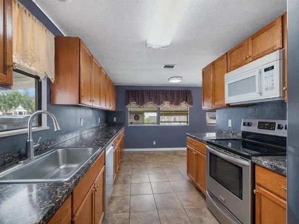 $98,000 | 225 Northeast Forrest Court, Jensen Beach, FL 34957