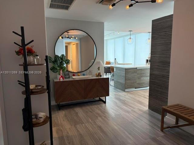 460 Northeast 28th Street, Unit 3408 Miami, FL 33137 - Photo 3 of 37 wooden floor with view of en suite bathroom