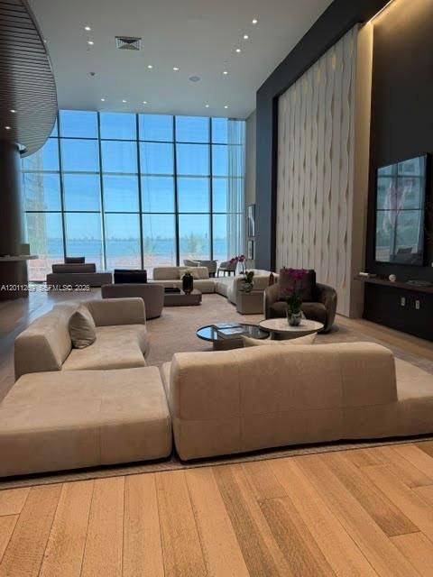 460 Northeast 28th Street, Unit 3408 Miami, FL 33137 - Photo 34 of 37 a living room with furniture and a large window