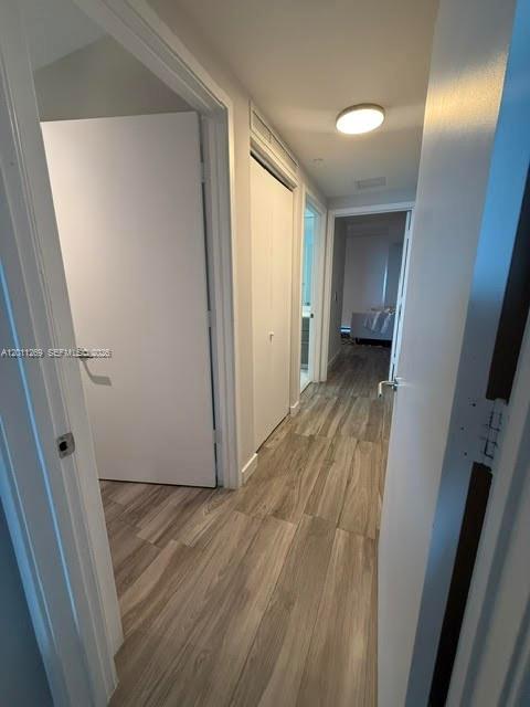 460 Northeast 28th Street, Unit 3408 Miami, FL 33137 - Photo 5 of 37 a view of hallway with wooden floor