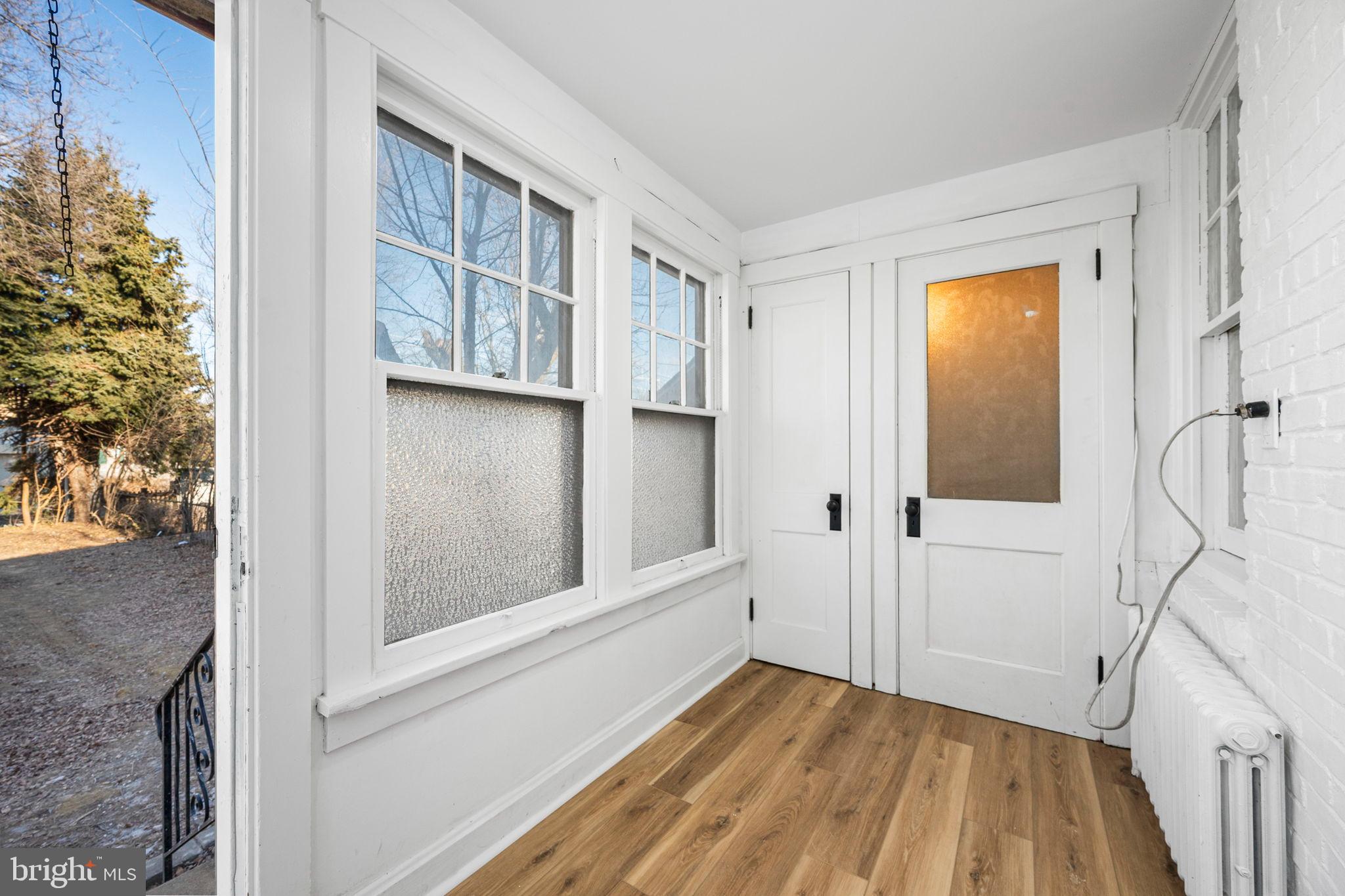 207 George Street Reading, PA 19605 - Photo 11 of 22 Bright entryway with charming glass details.
