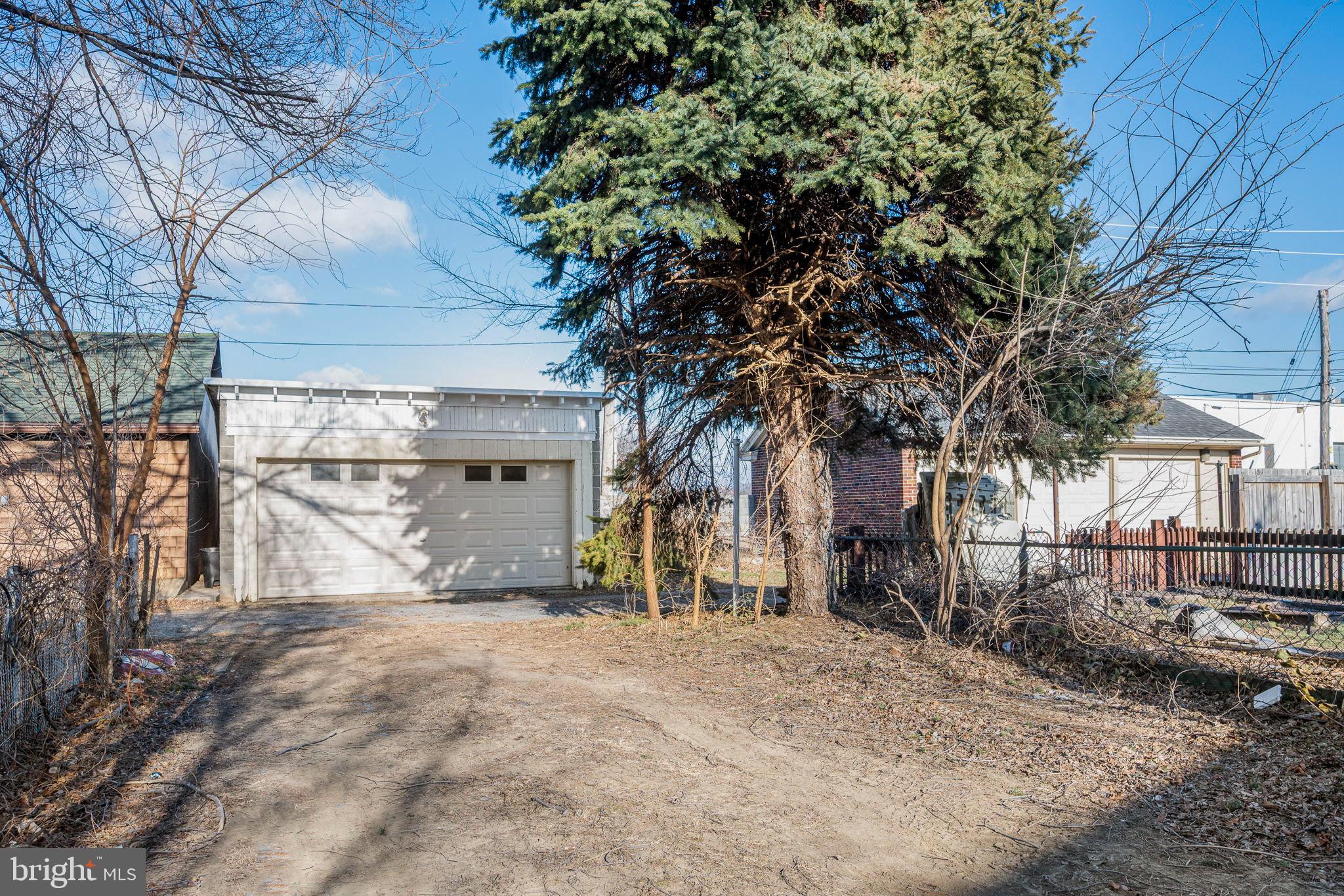 207 George Street Reading, PA 19605 - Photo 12 of 22 Spacious lot with garage and mature trees.