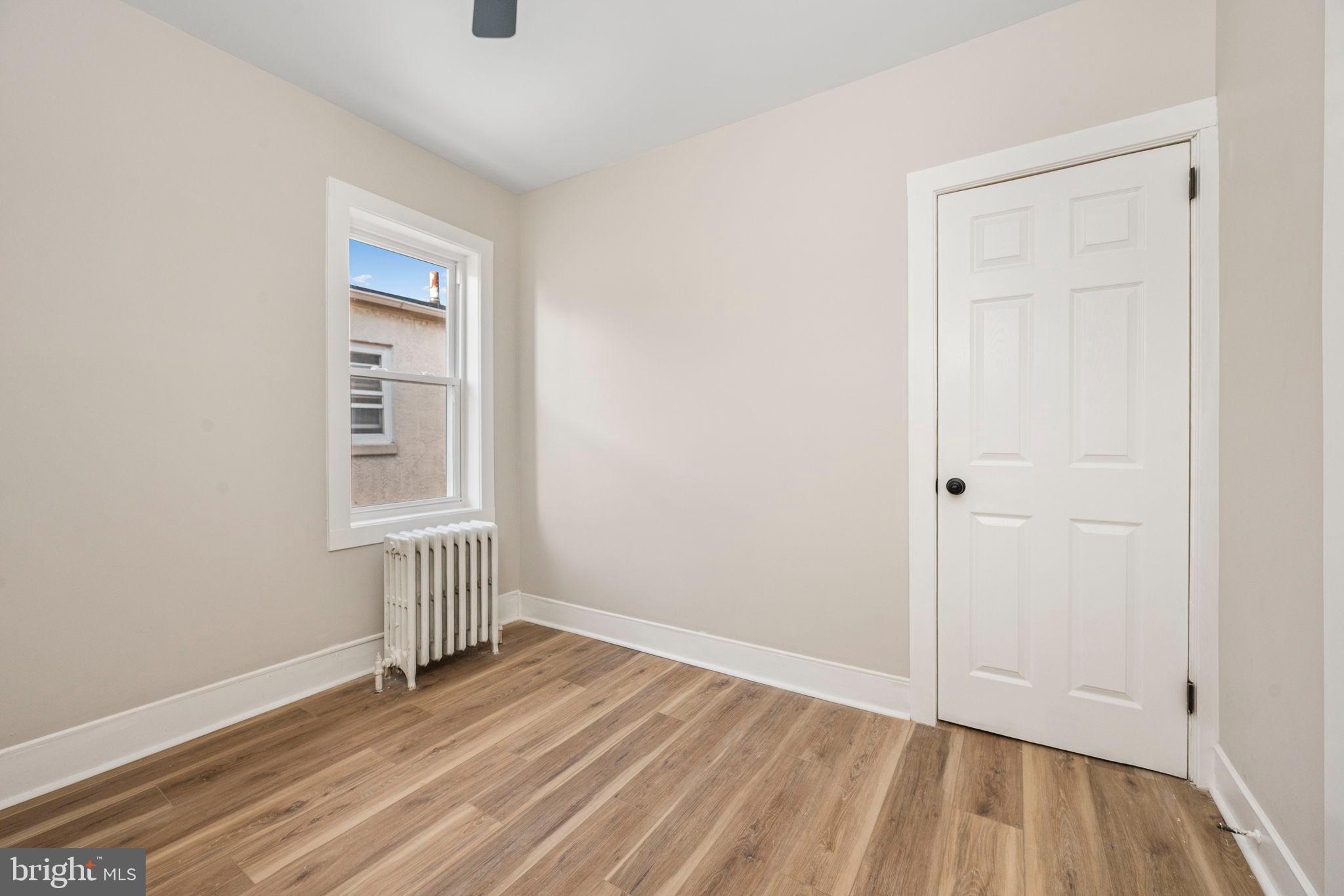 207 George Street Reading, PA 19605 - Photo 15 of 22 Bright and airy room with modern charm.