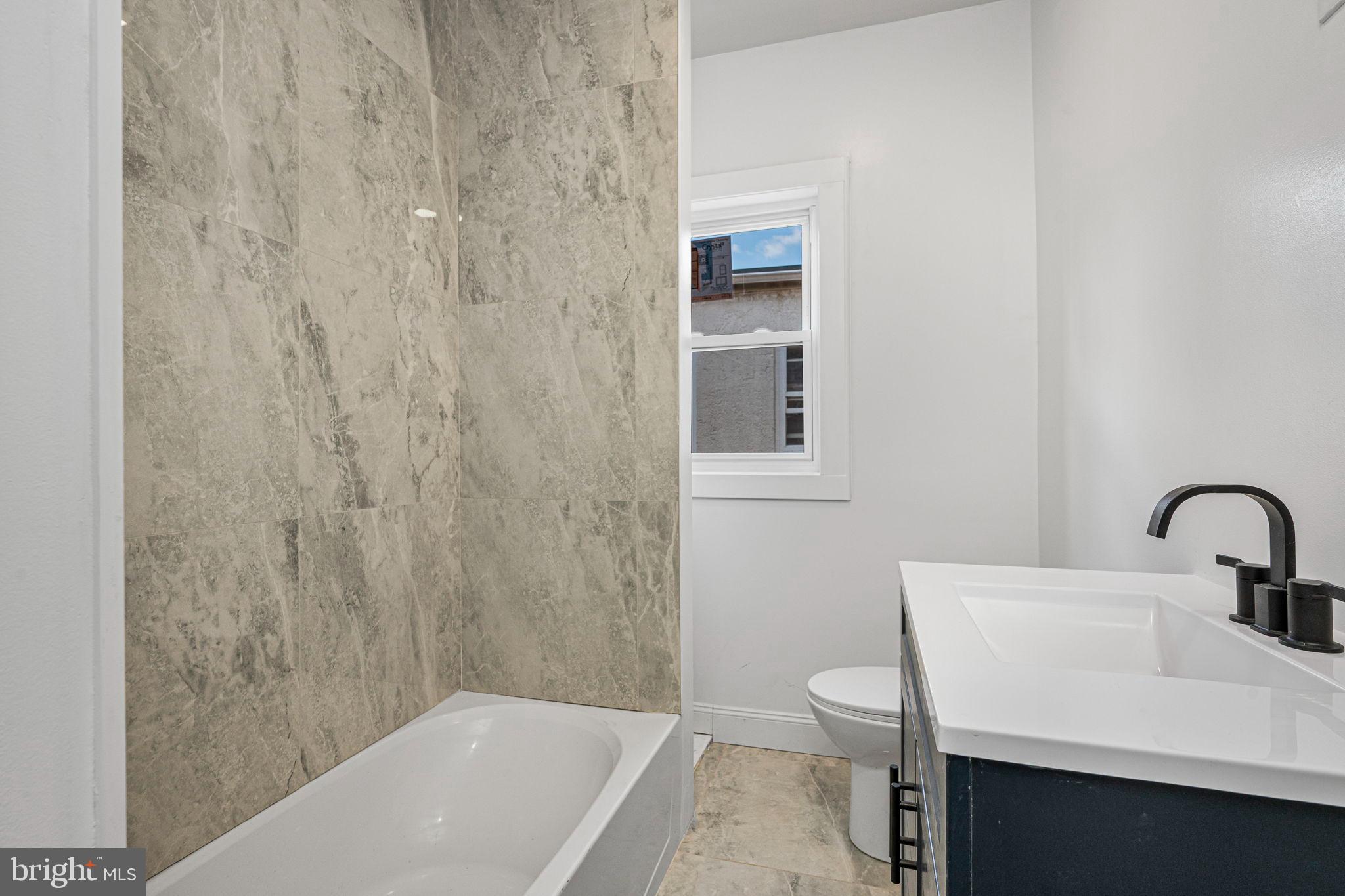 207 George Street Reading, PA 19605 - Photo 17 of 22 Modern bathroom with elegant finishes.