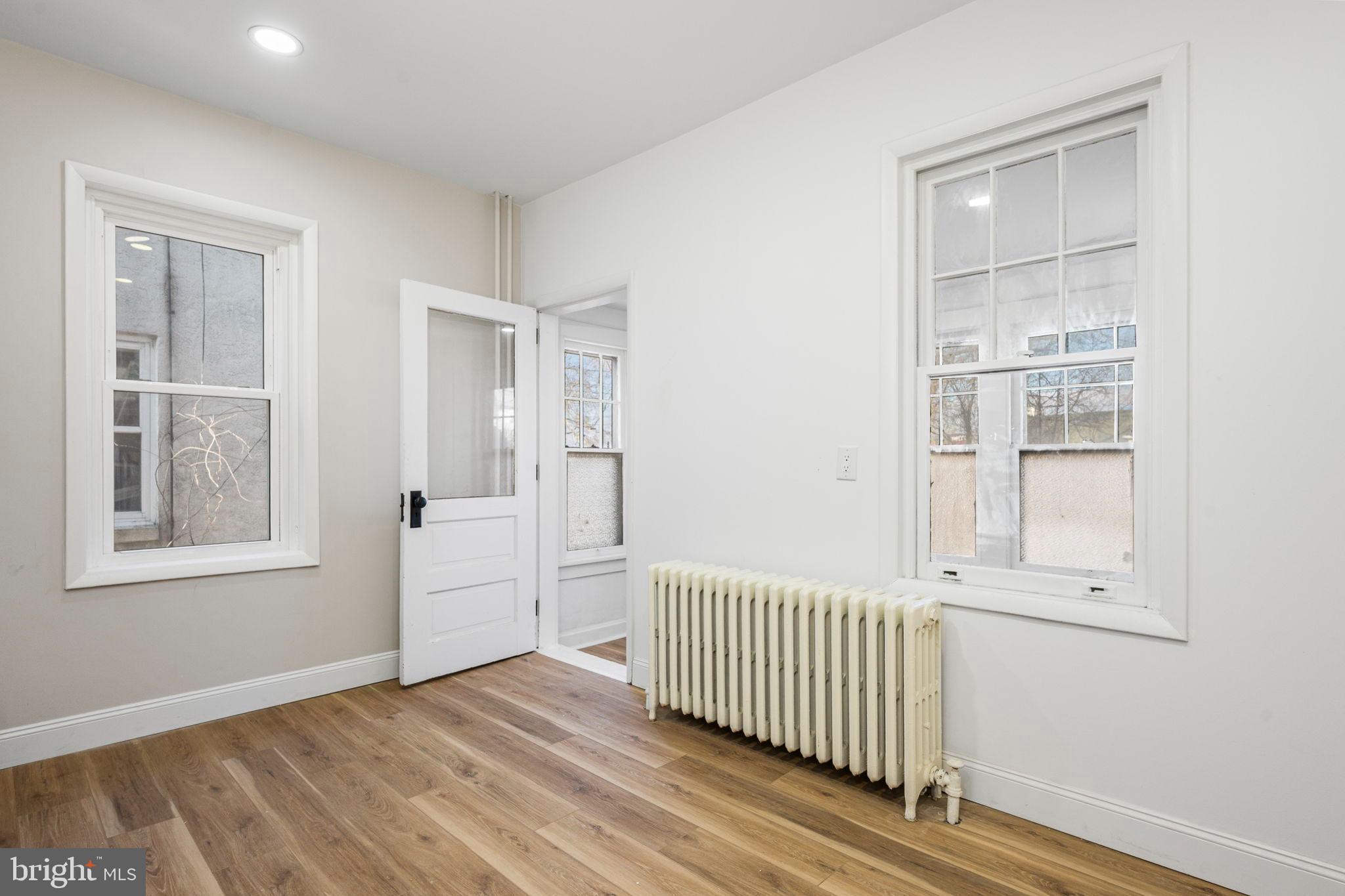 207 George Street Reading, PA 19605 - Photo 10 of 22 Bright and airy space with classic charm.
