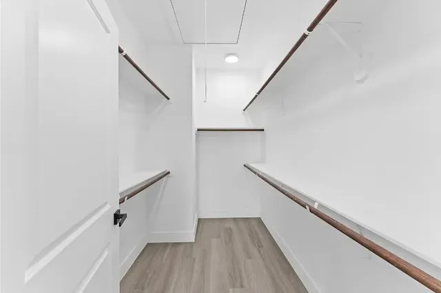 a view of entryway with wooden floor