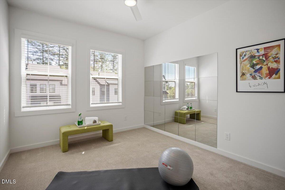 6419 Tanner Oak Lane Raleigh, NC 27613 - Photo 29 of 39 a living room with furniture and a window