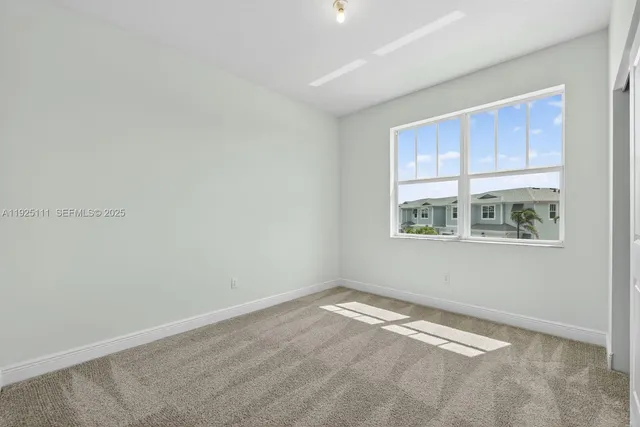 a view of a room with a window