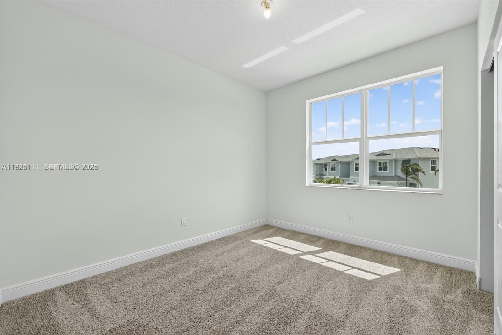 3585 Northwest Solange Court, Unit 3585 Jensen Beach, FL 34957 - Photo 25 of 33 a view of a room with a window