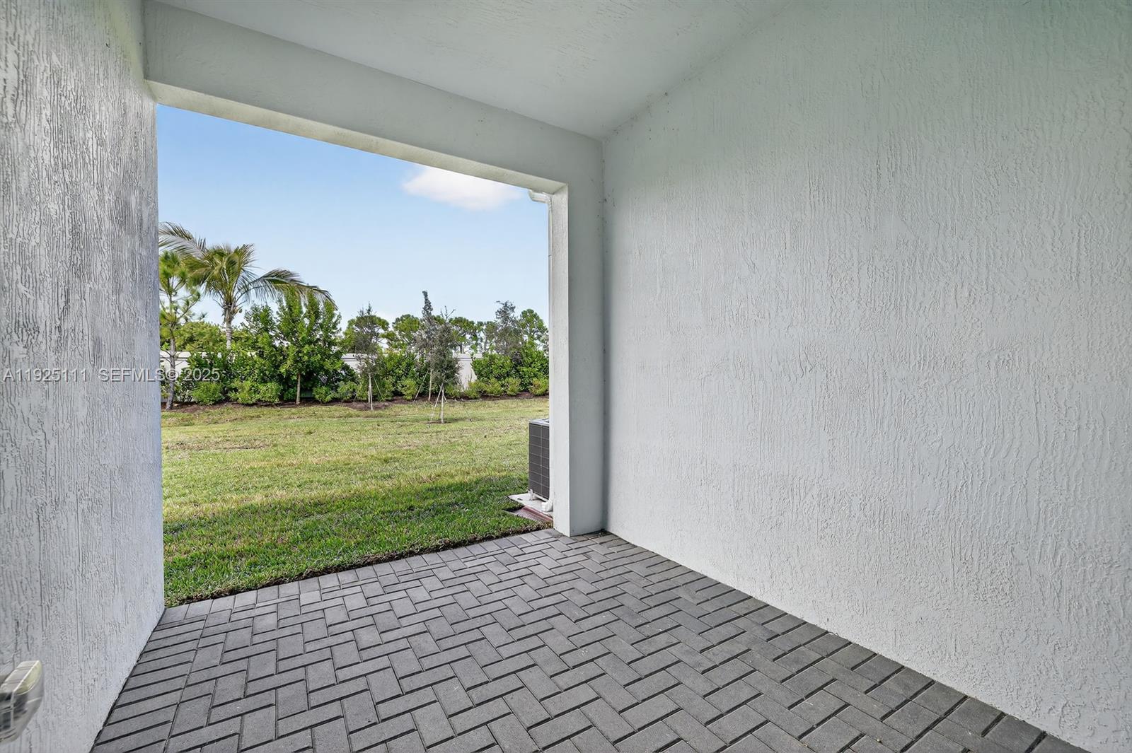 3585 Northwest Solange Court, Unit 3585 Jensen Beach, FL 34957 - Photo 28 of 33 a view of outdoor space with yard