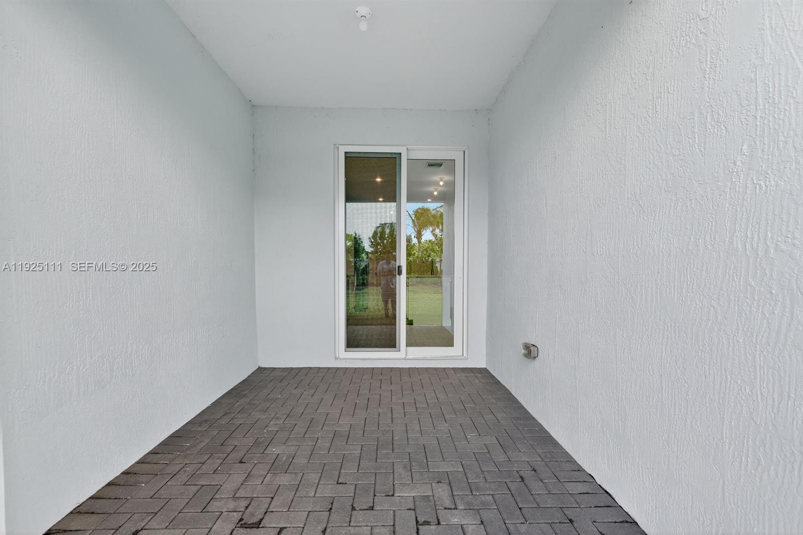 3585 Northwest Solange Court, Unit 3585 Jensen Beach, FL 34957 - Photo 29 of 33 wooden floor in a empty room