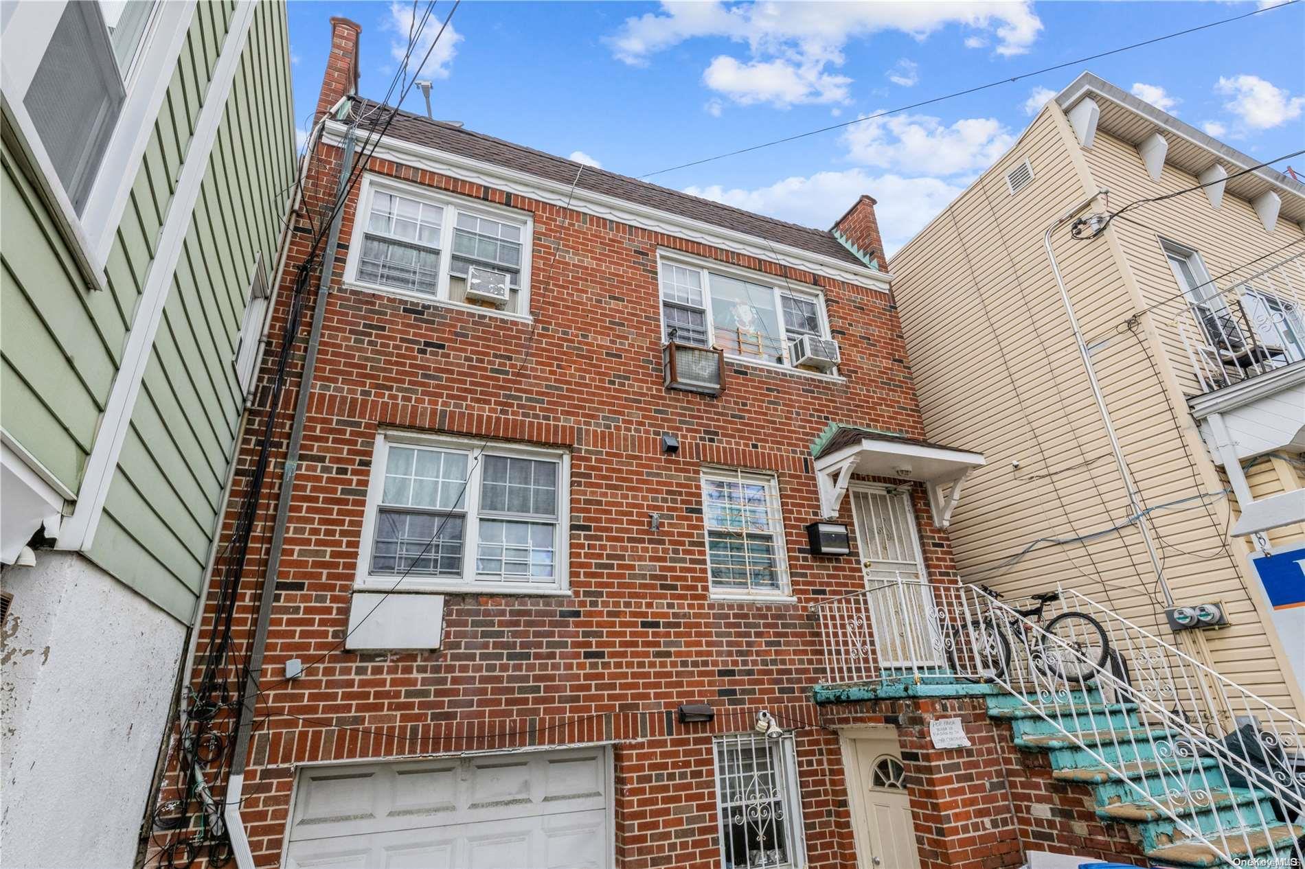 108-17 53rd Avenue Queens, NY 11368 - Photo 1 of 1 a front view of a house