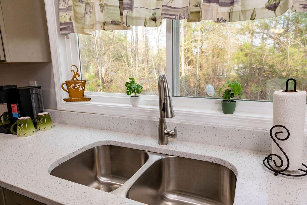 107 South Gates Road Pine Mountain, GA 31822 - Photo 5 of 18 a kitchen with a sink and a window