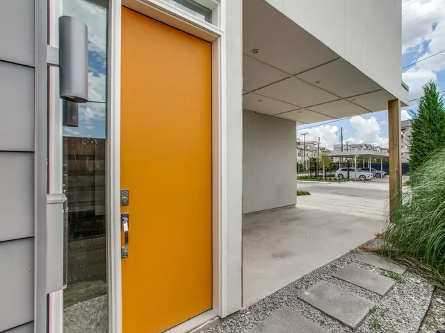 a view of a room with a door and porch