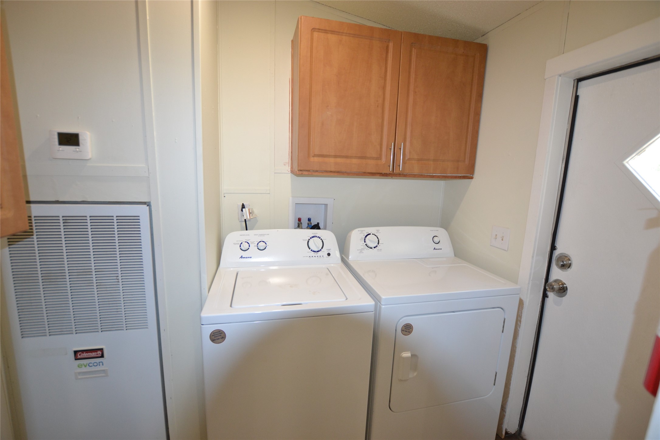 13402 U.S. Highway 190 Onalaska, TX 77360 - Photo 16 of 16 a utility room with dryer and washer