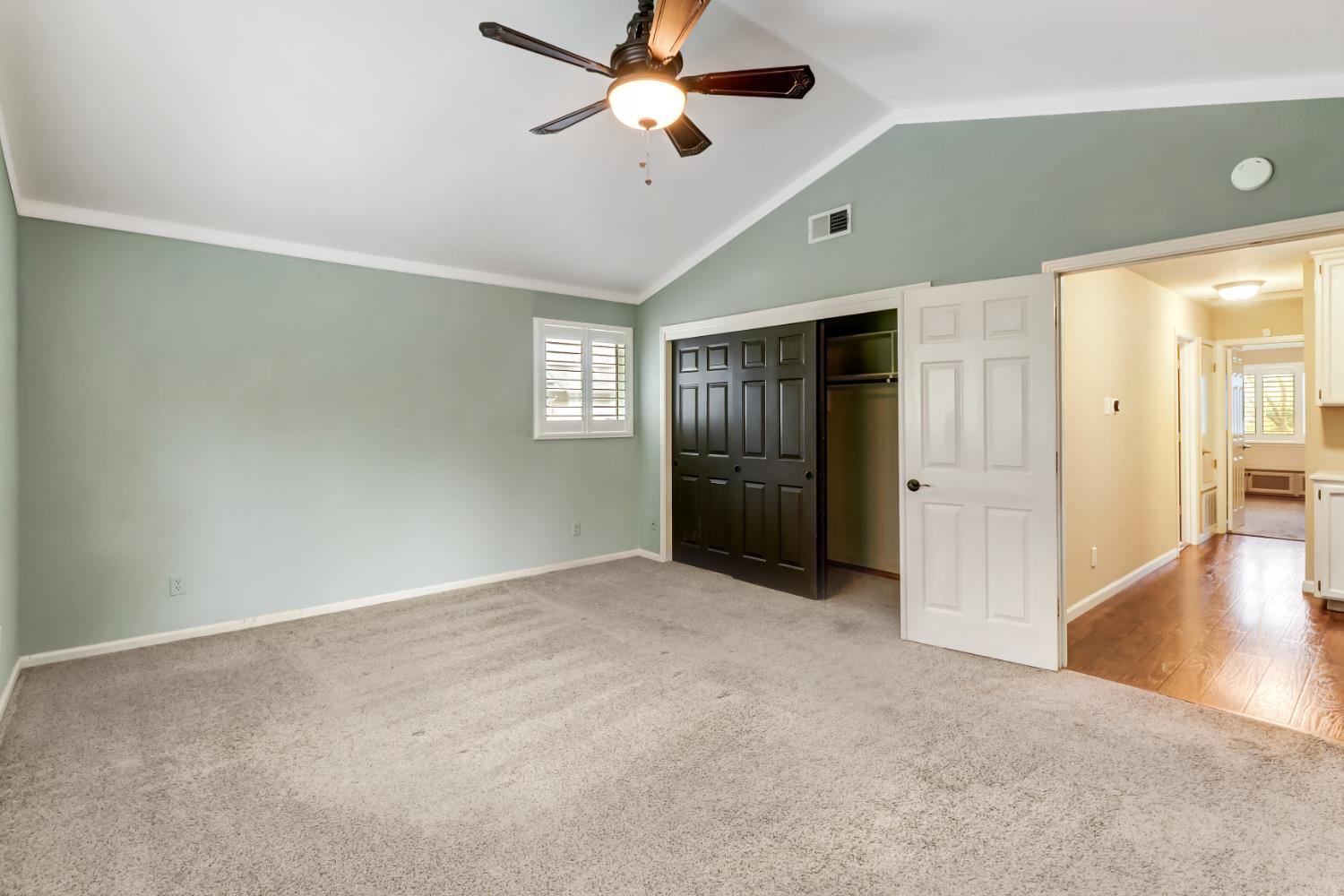 4683 Abrijo Road Cameron Park, CA 95682 - Photo 17 of 53 an empty room with windows and fan