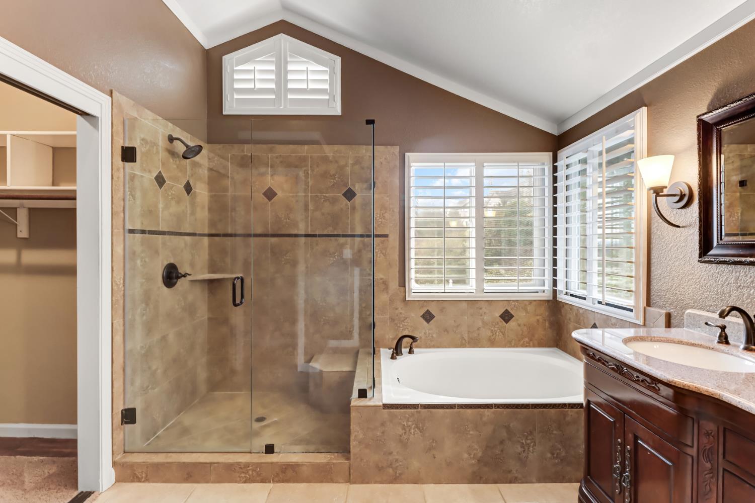 4683 Abrijo Road Cameron Park, CA 95682 - Photo 20 of 53 a bathroom with a tub shower and sink