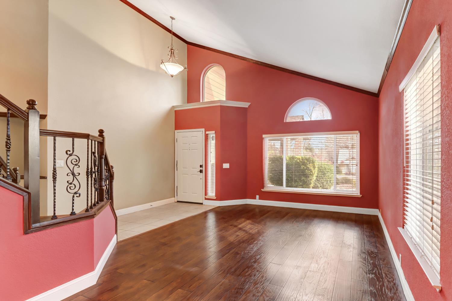 4683 Abrijo Road Cameron Park, CA 95682 - Photo 2 of 53 a view of a livingroom with wooden floor and windows