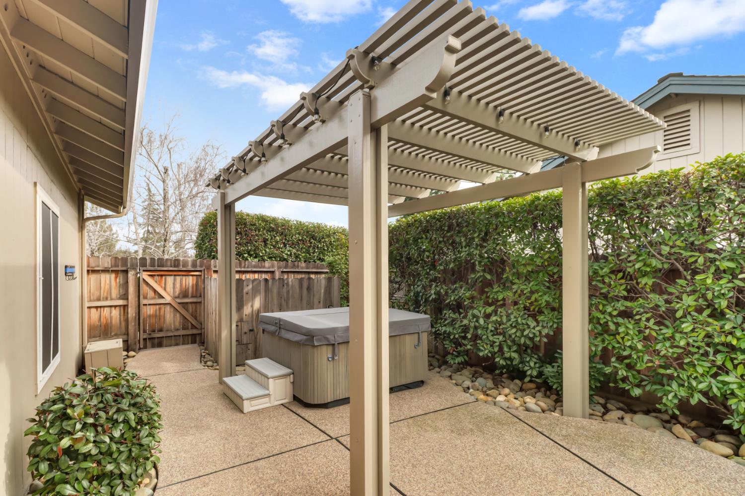 4683 Abrijo Road Cameron Park, CA 95682 - Photo 36 of 53 a view of a patio with table and chairs and potted plants