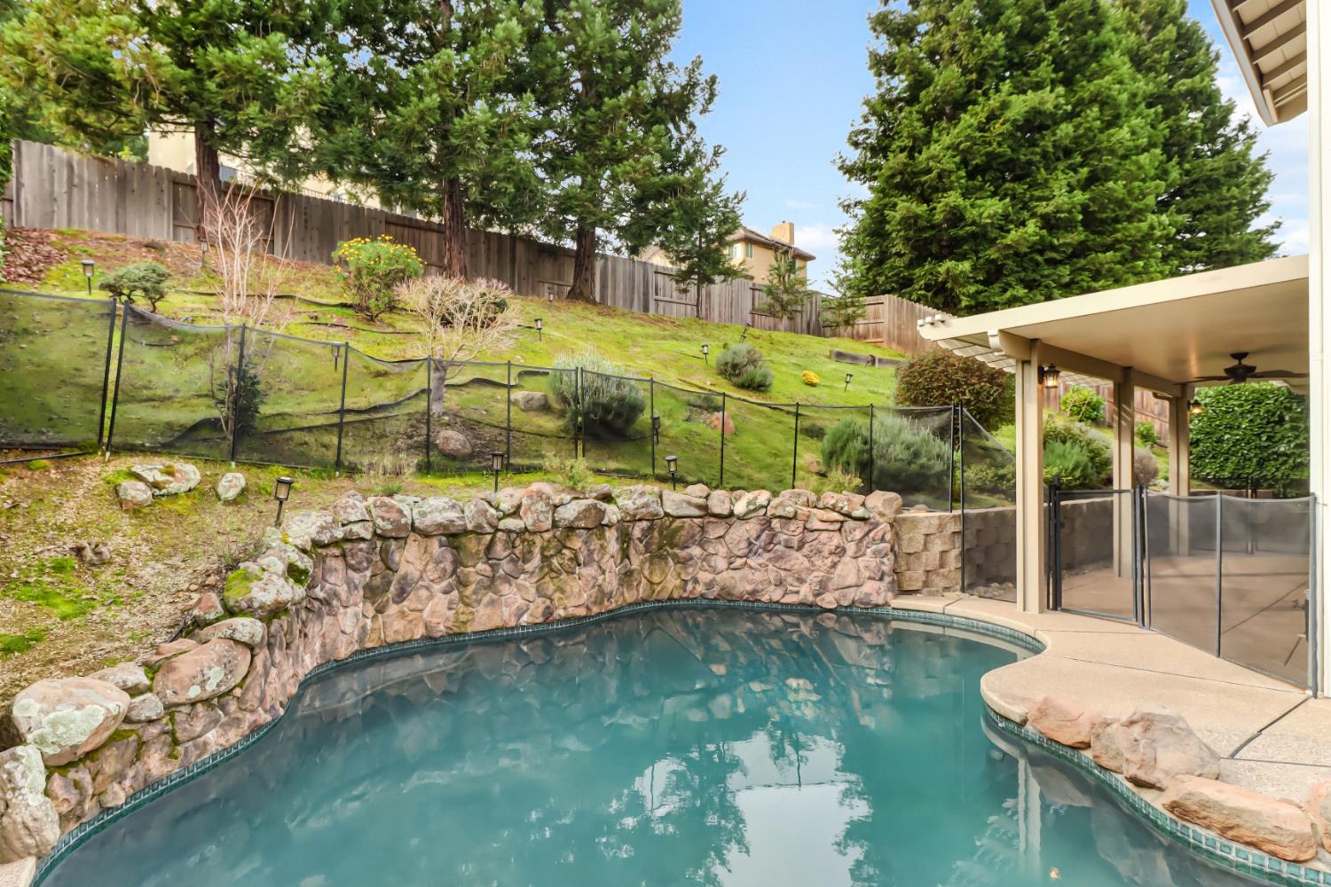 4683 Abrijo Road Cameron Park, CA 95682 - Photo 39 of 53 a view of swimming pool with a patio