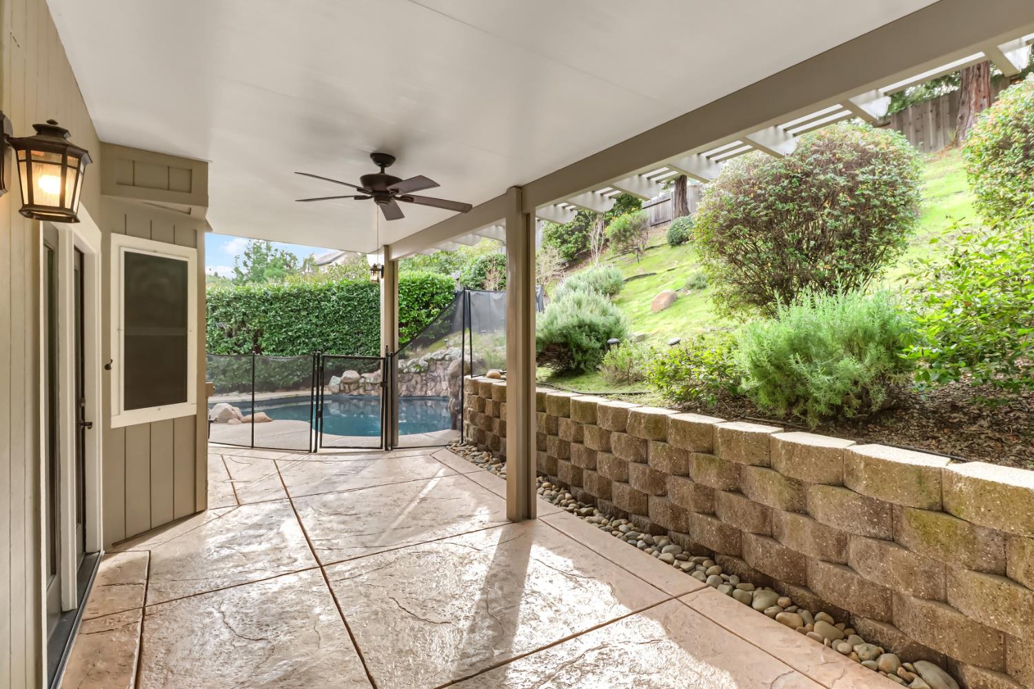 4683 Abrijo Road Cameron Park, CA 95682 - Photo 50 of 53 a view of a porch with furniture and a yard