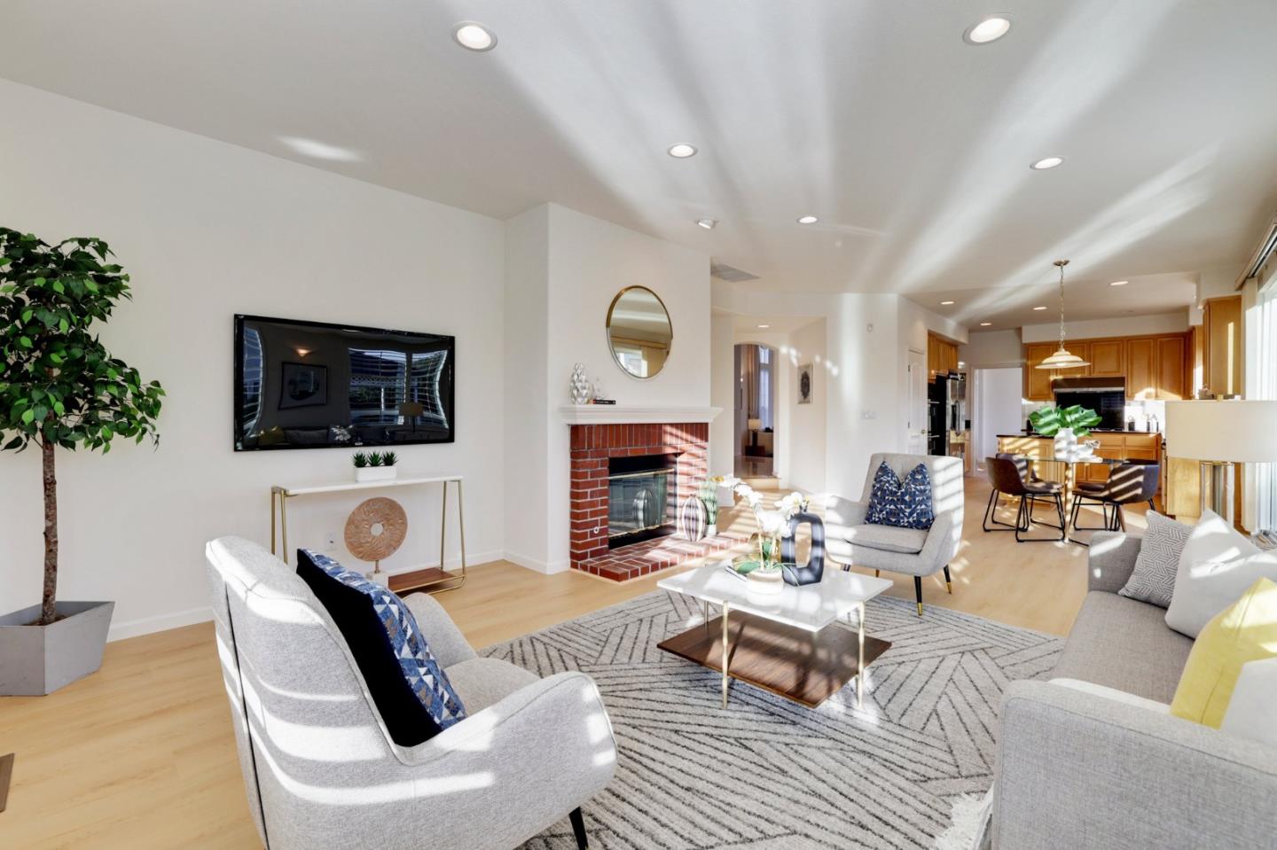 313 Lower Vintners Circle Fremont, CA 94539 - Photo 23 of 50 a living room with fireplace furniture and a flat screen tv