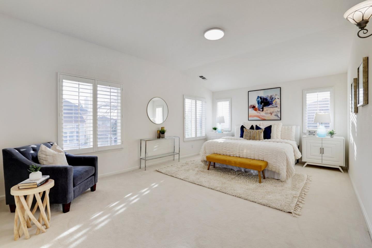 313 Lower Vintners Circle Fremont, CA 94539 - Photo 35 of 50 a spacious bedroom with a bed and a table