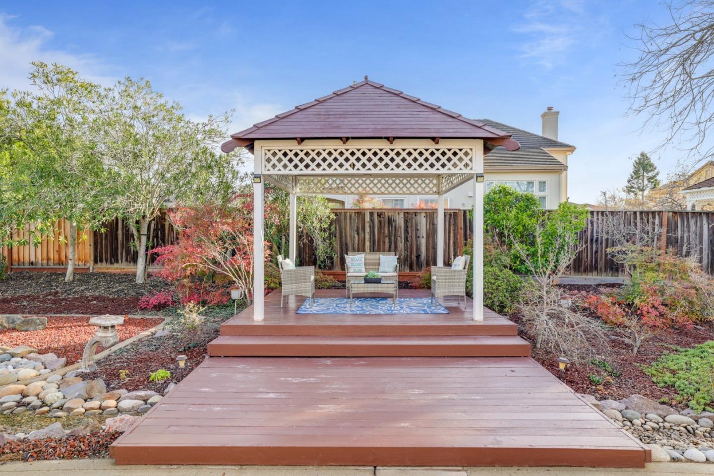 313 Lower Vintners Circle Fremont, CA 94539 - Photo 43 of 50 a view of a house with sitting area and garden