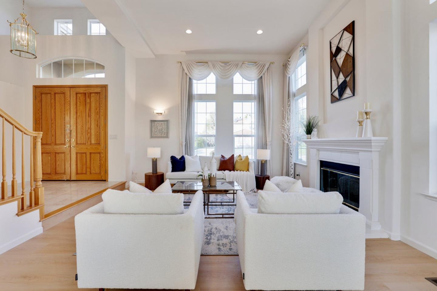 313 Lower Vintners Circle Fremont, CA 94539 - Photo 8 of 50 a living room with furniture and a fireplace