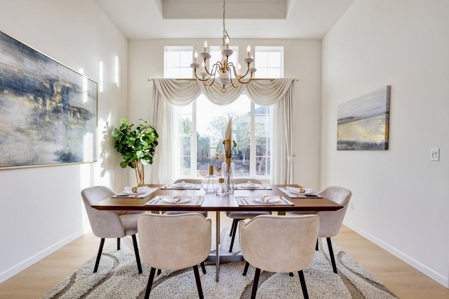 313 Lower Vintners Circle Fremont, CA 94539 - Photo 9 of 50 a dining room with furniture and chandelier