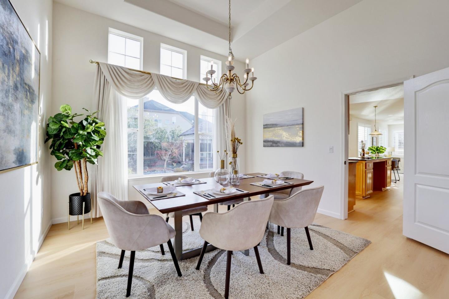 313 Lower Vintners Circle Fremont, CA 94539 - Photo 10 of 50 a view of a dining room with furniture window and wooden floor