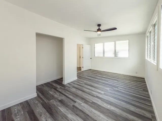 a bathroom with a toilet sink and shower
