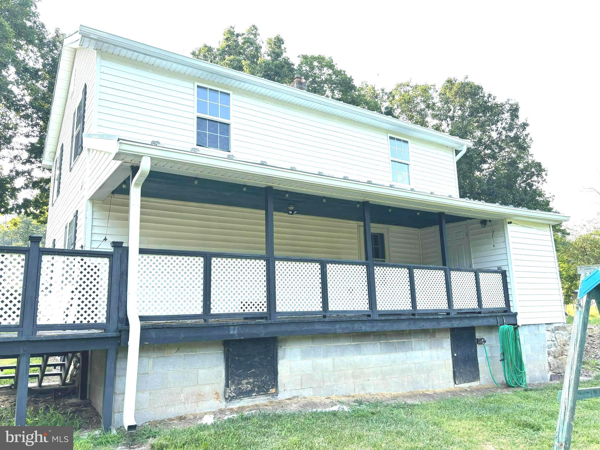 2600 Middle Cove Road Mathias, WV 26812 - Photo 5 of 30 a house that has a large window in it