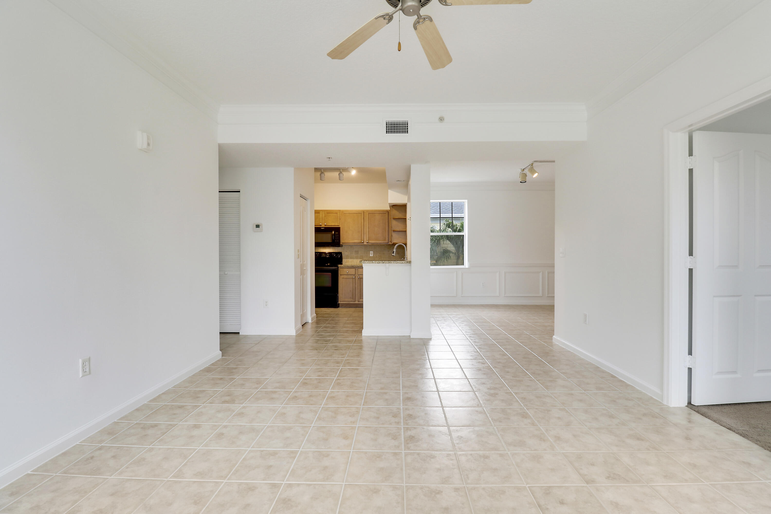 225 Murcia Drive, Unit 307 Jupiter, FL 33458 - Photo 12 of 36 a view of an empty room with a window