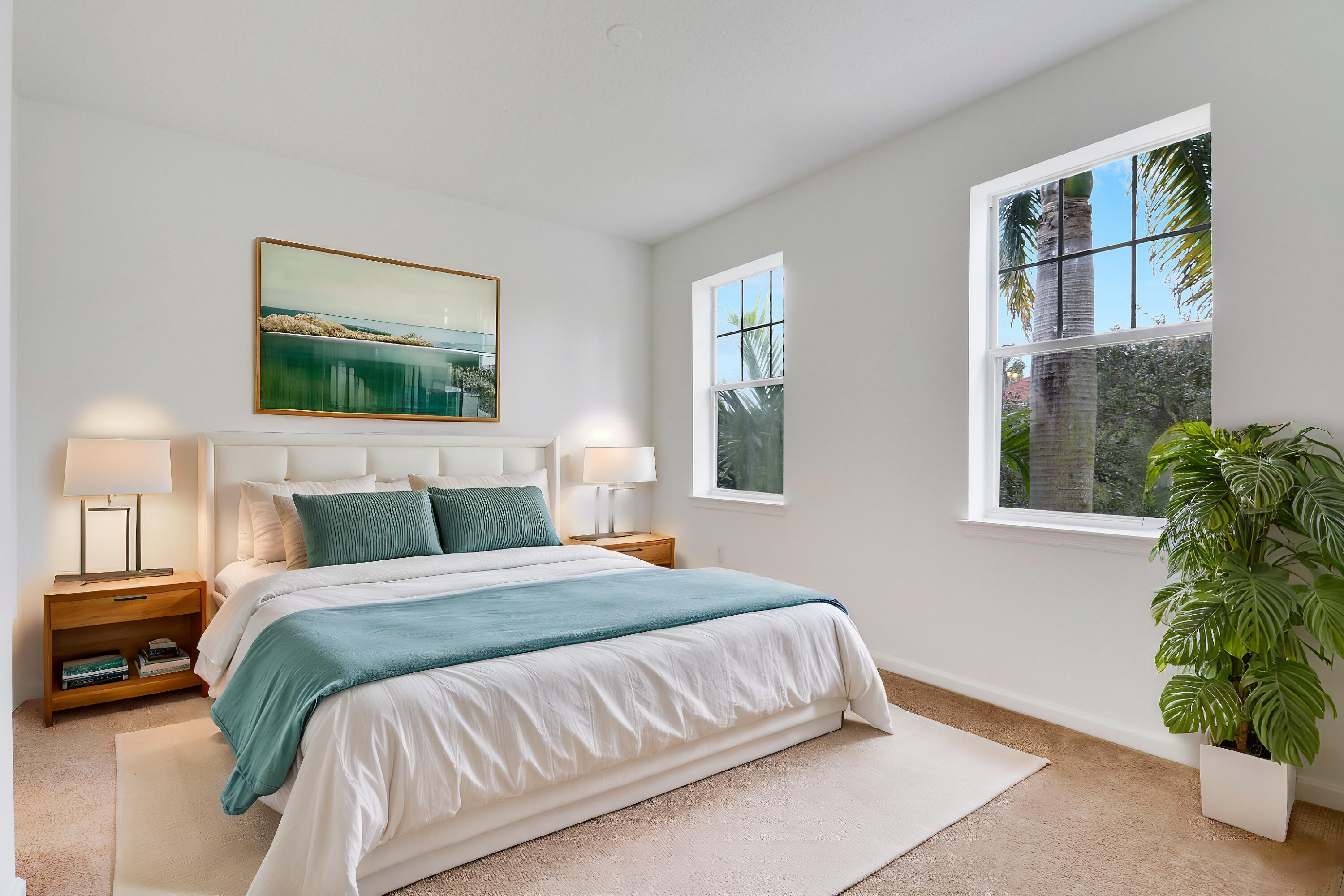 225 Murcia Drive, Unit 307 Jupiter, FL 33458 - Photo 19 of 36 a bedroom with a bed table and window