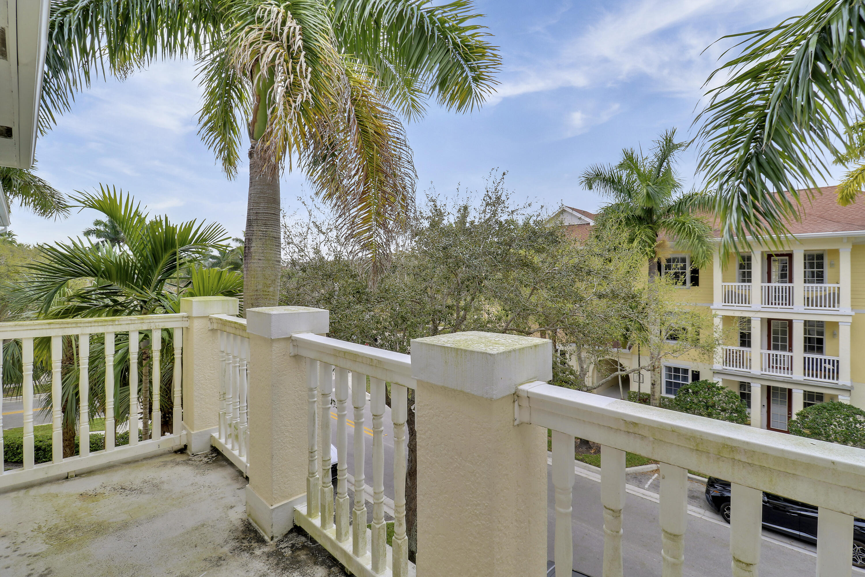 225 Murcia Drive, Unit 307 Jupiter, FL 33458 - Photo 33 of 36 a view of a yard with a palm tree