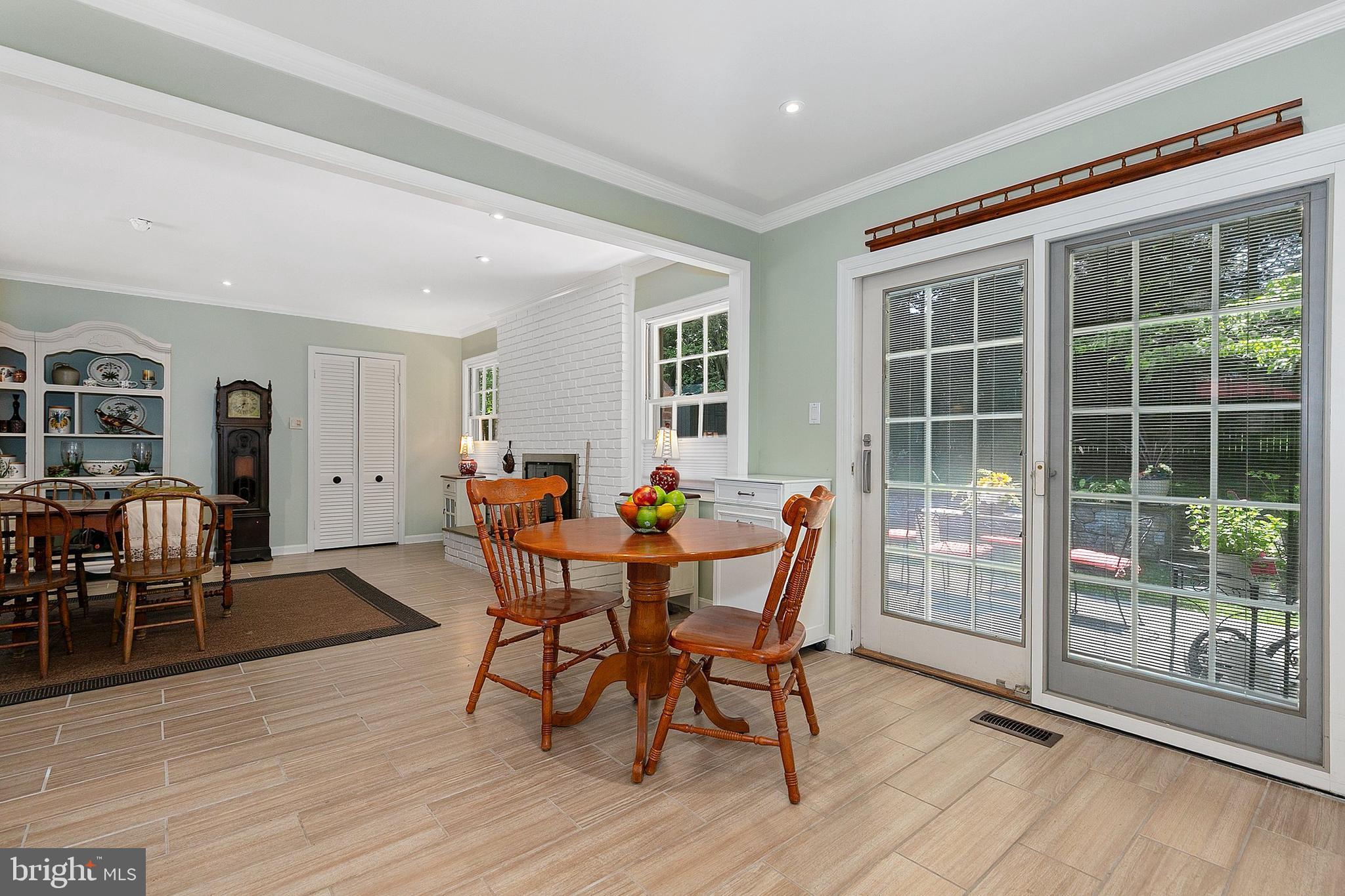 3004 Bluff Point Lane Silver Spring, MD 20906 - Photo 26 of 74 a view of a dining room with furniture and wooden floor