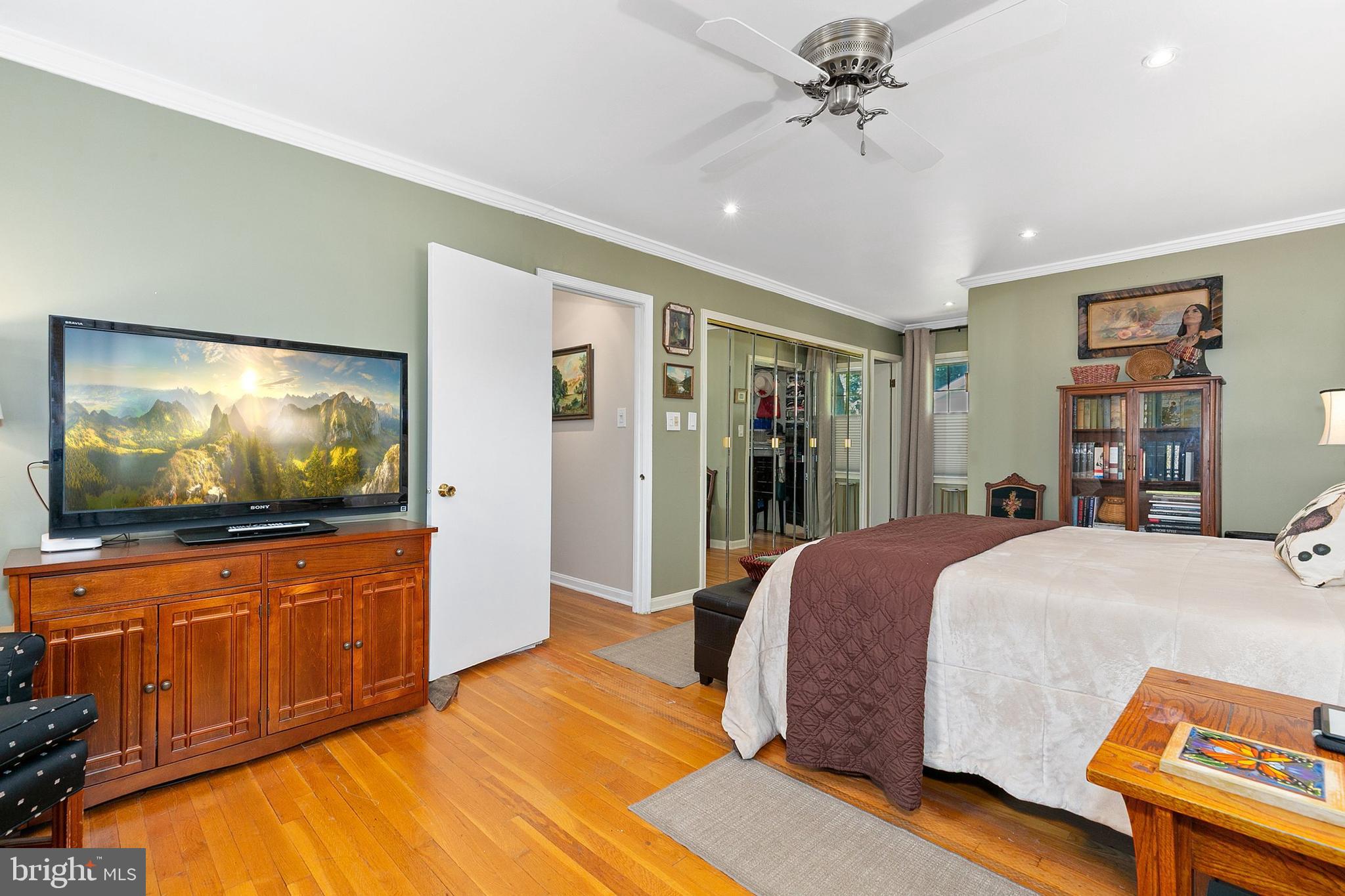 3004 Bluff Point Lane Silver Spring, MD 20906 - Photo 34 of 74 a bedroom with a bed and a flat screen tv