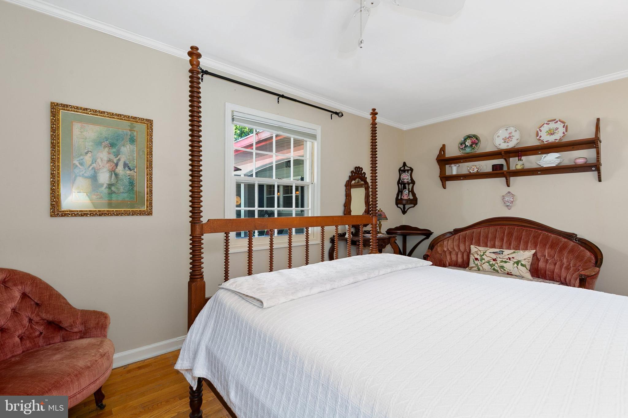 3004 Bluff Point Lane Silver Spring, MD 20906 - Photo 43 of 74 a bedroom with a bed a dresser and a large mirror