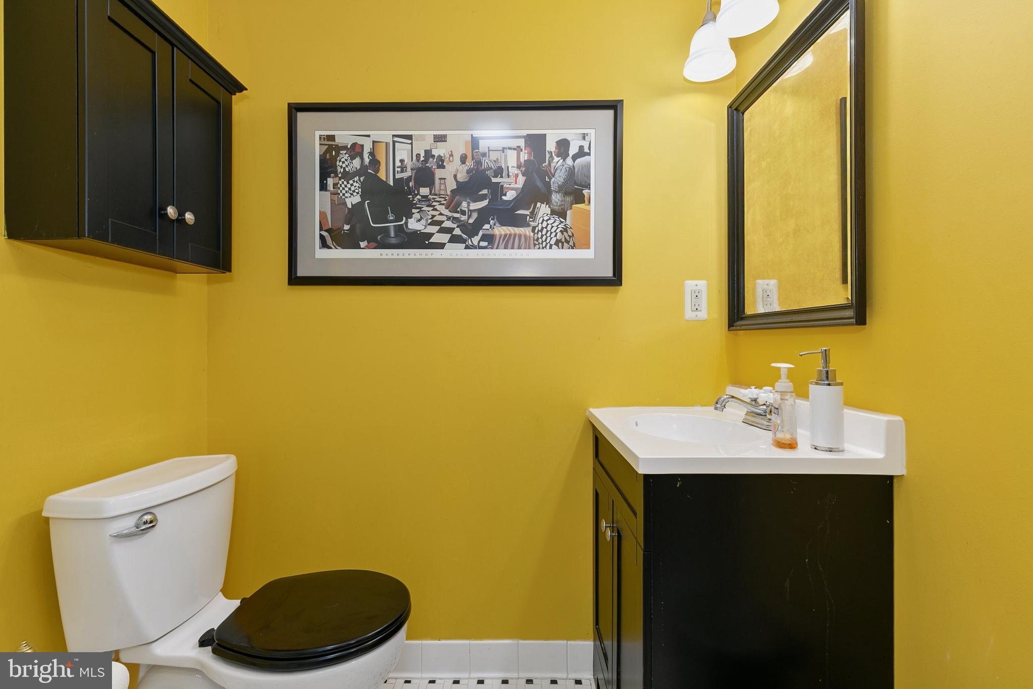 3004 Bluff Point Lane Silver Spring, MD 20906 - Photo 49 of 74 a bathroom with a sink and a toilet