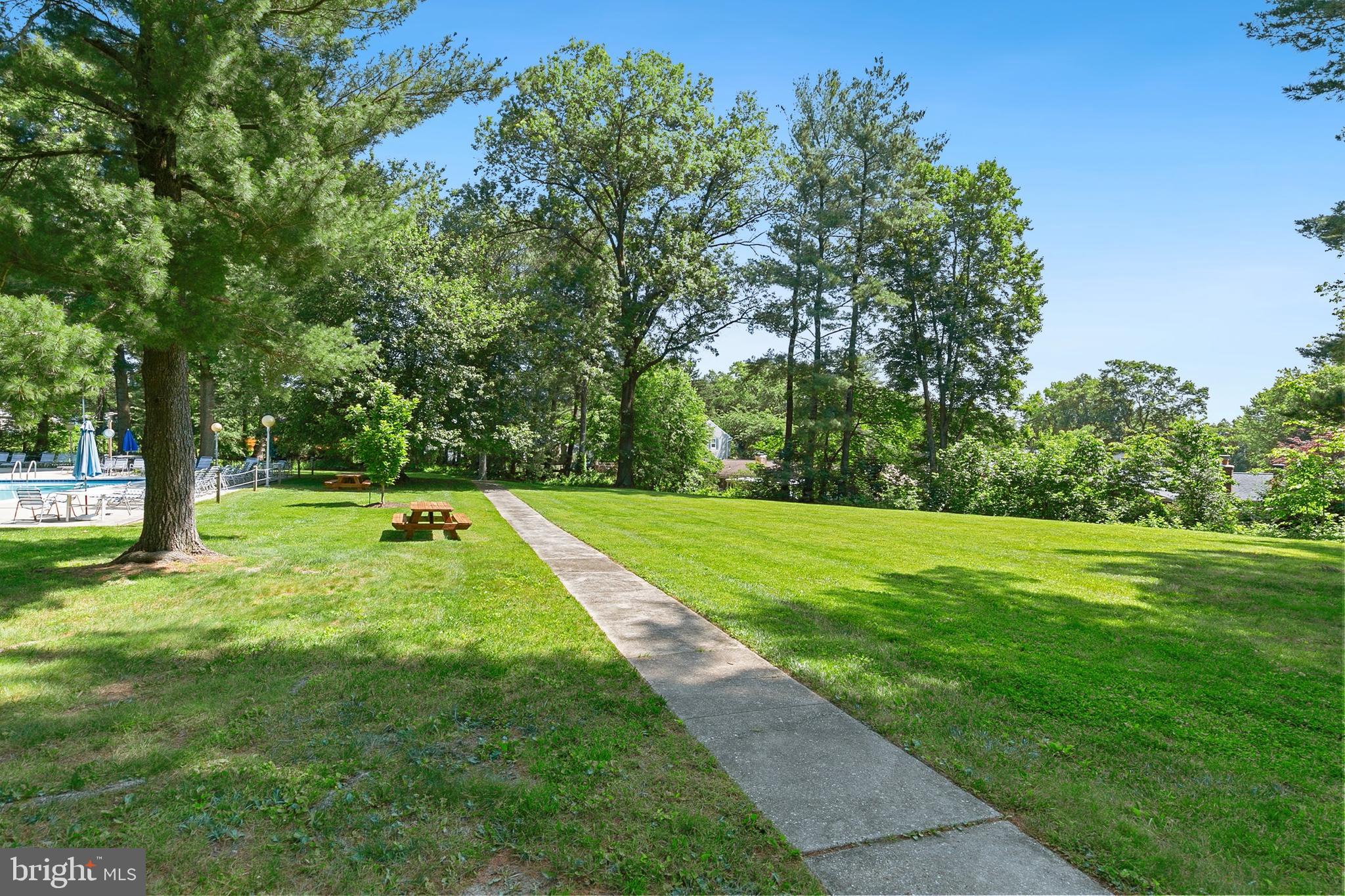 3004 Bluff Point Lane Silver Spring, MD 20906 - Photo 70 of 74 a view of a swimming pool with a yard