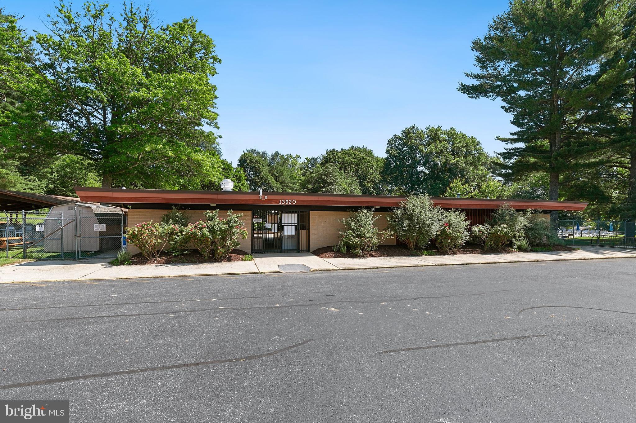 3004 Bluff Point Lane Silver Spring, MD 20906 - Photo 74 of 74 front view of a house with a yard and potted plants