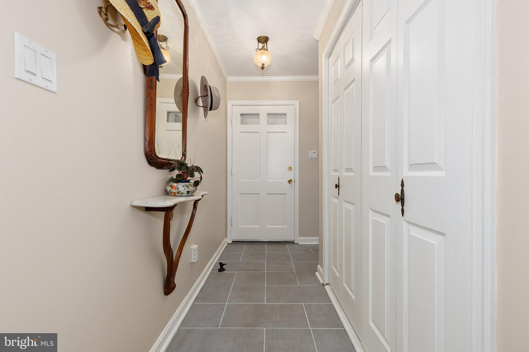 3004 Bluff Point Lane Silver Spring, MD 20906 - Photo 9 of 74 a view of a hallway with wooden floor and staircase