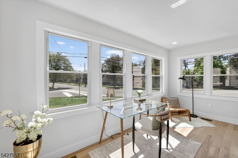 909 Ridgewood Road Millburn, NJ 07041 - Photo 6 of 33 a view of a dining room with furniture window and outside view