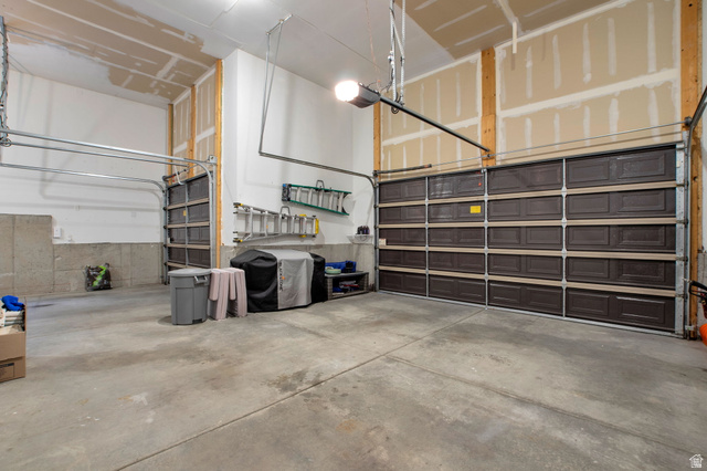 577 South Ridge Top Lane East North Salt Lake, UT 84054 - Photo 39 of 57 Extra-deep garage designed to accommodate vehicles, recreational equipment, and workshop space.