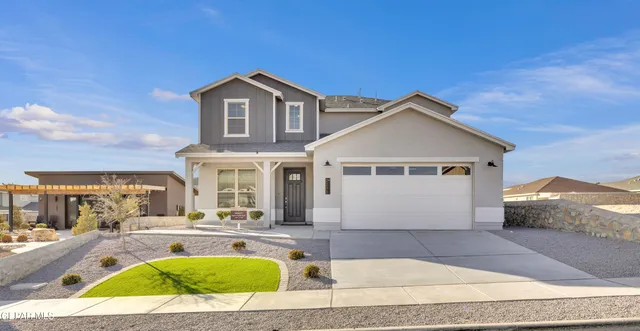 a view of a house with a swimming pool