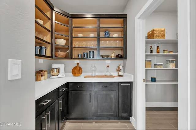 a kitchen with a sink and a window