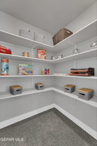 a swimming pool with outdoor seating and yard