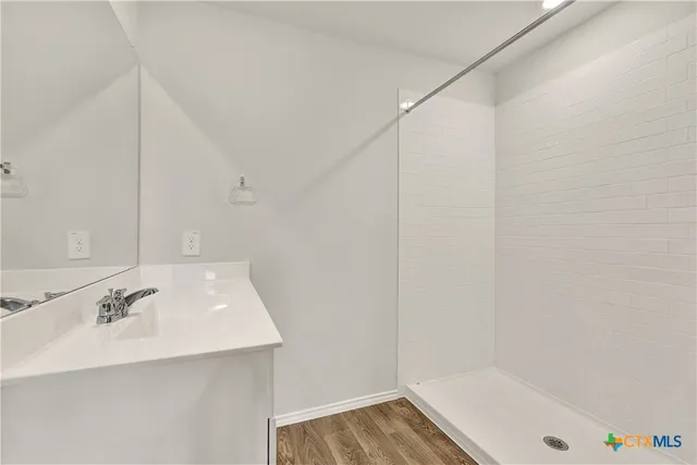 a bathroom with a sink and a bathtub